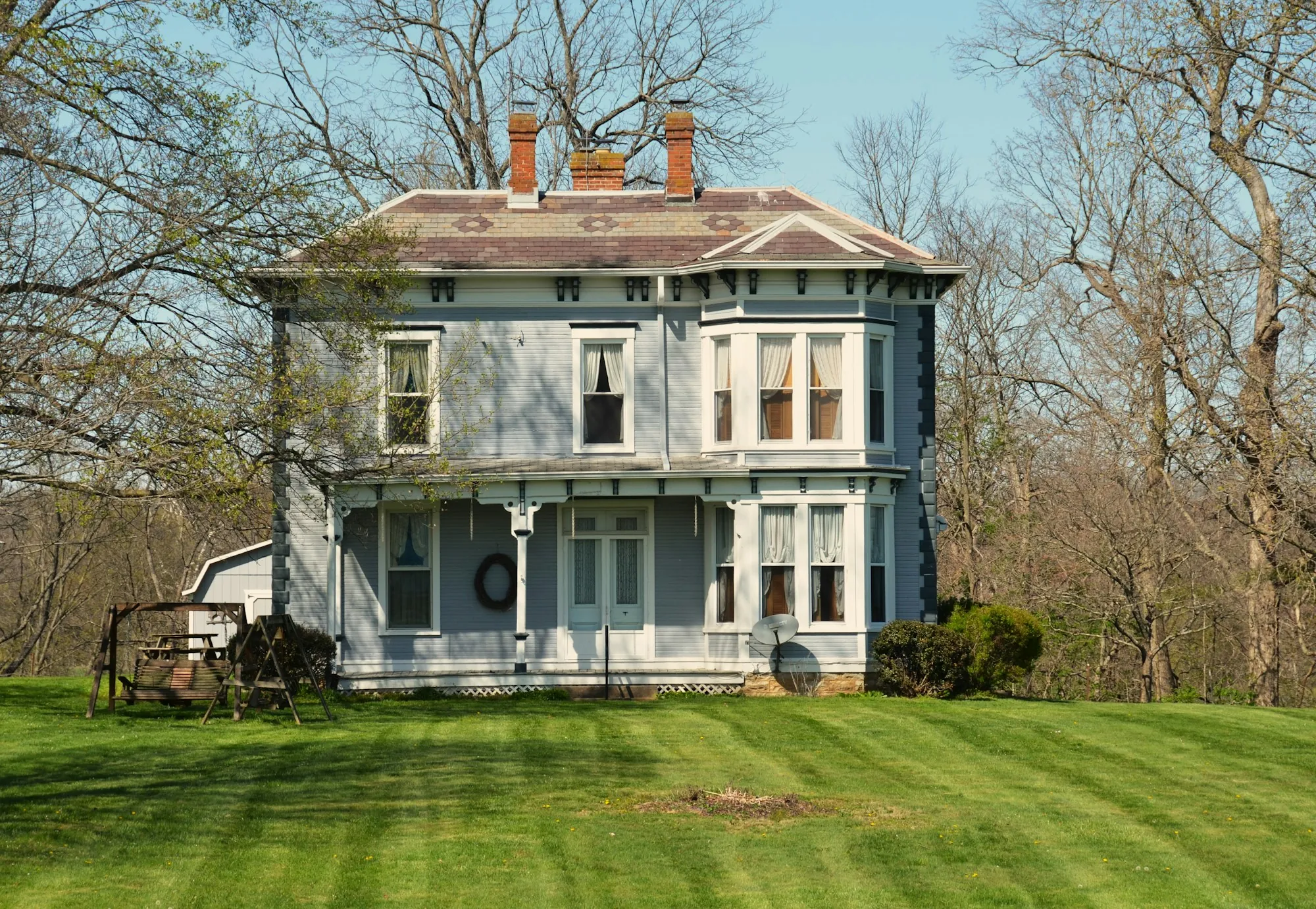 Victorian house on a wide lawn